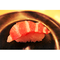 ほっぺの落ちるおいしい肉寿司の写真素材